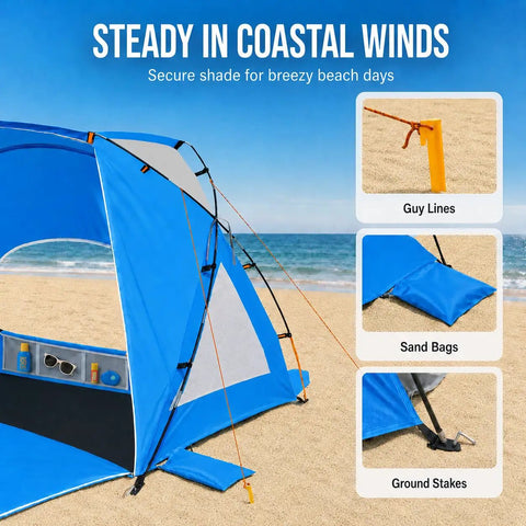 Portable Beach Sun Shelter For 2 To 8 People, UPF 50 Plus UV Protection, showing setup with guy lines, sand bags, and stakes on beach.