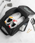 Open black personalized golf shoe bag for men and women with custom monogram and embroidered initials, showing shoes and accessories.