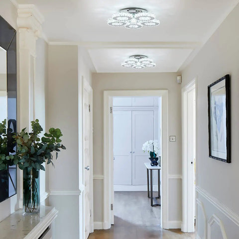 Crystal Flush Mount Ceiling Light With Remote Control, Dimmable LED Chandelier With 5 Ring Design in a modern hallway.