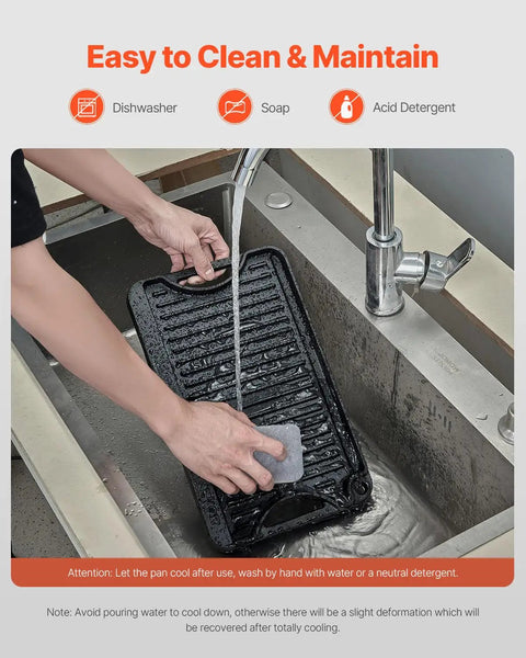 Person washing Reversible Cast Iron Grill And Griddle Pan Fourteen By Eight And A Half Inch Preseasoned in sink