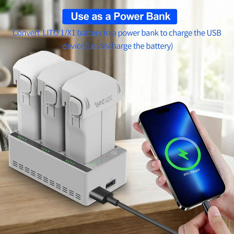 Two-Way Battery Charging Hub For LITO X1 And LITO 1 Drones used as power bank, charging smartphone next to three drone batteries