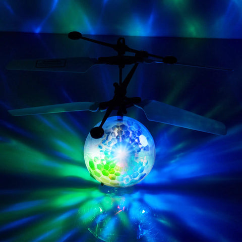 Indoor Hand Operated Flying Orb Ball Toy For Kids With LED Lights Remote Control Mini UFO Drone glowing in dark room