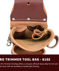 Interior view of Pro Trimmer Tool Bag With 9 Pockets And Tool Holders For Trim And Finish Work, leather material with slots.