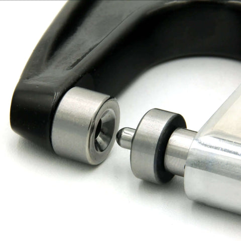 Close-up of Four Piece 100 Degree Dimple Die Set for Sheet Metal installed on a hand rivet squeezer, showing metal construction.