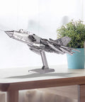 3D Metal Puzzle Tornado Fighter Jet Kit for Adults and Teens, 83-Piece DIY Military Aircraft Model on a desk with plant