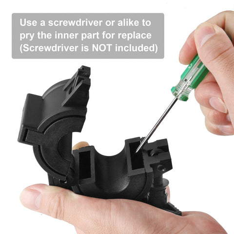 Black plastic stage light O-clamp for 1–2 inch pipe, being tightened with a screwdriver