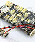 Pixhawk I2C Splitter Expand Module For Flight Controllers Lets You Add Four Extra I2C Ports So You Can Run A Compass External LED Digital Airspeed Sensor And More With Easy Plug In Setup, shown with connectors and wires.