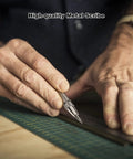 Close-up of person using Two Pack Tungsten Carbide Scriber Tool Set With Magnetic Tip on a metal surface for precision marking.