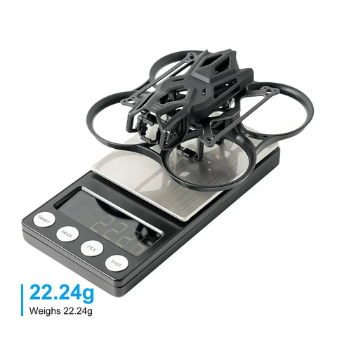 Pavo Femto Brushless Whoop Frame With HD VTX Bracket And Camera Canopy For O4 Air Unit Modular on scale showing 22.24g