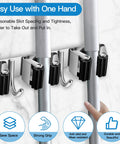 Broom And Mop Holder Wall Mount With Five Slots And Four Hooks Self Adhesive Stainless Steel Organizer for easy tool access