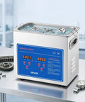 Heavy Duty Ultrasonic Cleaner With A Spacious Three Liter Tank And Zippy 40kHz Output, features digital controls and gears inside.