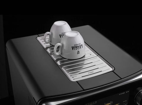 Accademia Luxury Italian Fully Automatic Espresso Machine With 19 On Demand Beverages Massive Customization Glass Touchscreen Commercial Steam Wand Brushed Stainless Steel Build Made In Italy top view with cup warmer and two cups