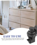 Keyless Push Button Cabinet Door Latch Built Tough Stainless Steel And Plastic Build displayed near dresser in interior setup.