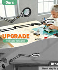 Person using Pro Grade 12X 30X Magnifying Glass With Light And Stand Long Arm Desk Magnifier for electronics work.