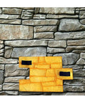 Granite Look Dope Texturing Stamp Mat for Concrete and Cement in slate pattern, showcased against textured stone wall.