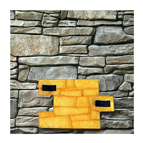 Granite Look Dope Texturing Stamp Mat for Concrete and Cement in slate pattern, showcased against textured stone wall.