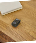 Close-up of a Six Pack Durable Nylon Belt Buckle Quick Release Webbing Clip on a wooden table.
