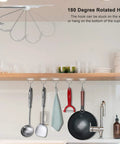 Heavy Duty Adhesive Hooks Up To 11 Lbs Seamless Clear Wall Hangers Without Nails 8 Pack used for hanging kitchen utensils.