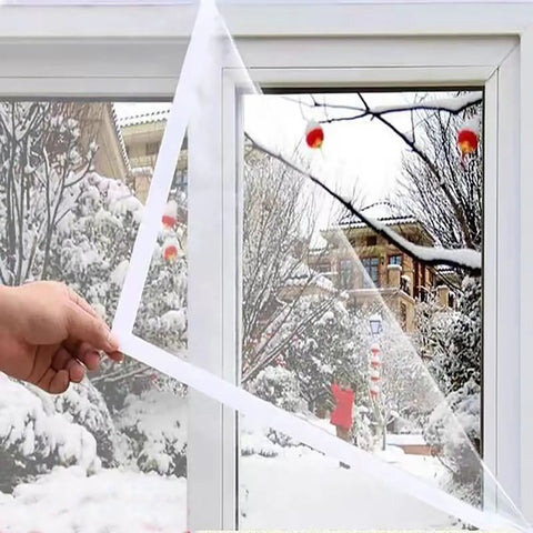 Ditch The Winter Chill With Adjustable Clear Window Insulation Kit Featuring Tough Adhesive Strips Reusable Plastic Film Wrap on window.