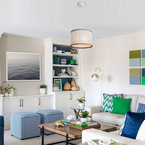 Bohemian Wood Beaded Chandelier Three Light Pendant With White Finish in a cozy living room setting with blue accents.
