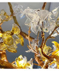 Premium Branch Style Crystal Chandelier With Antique Brass Finish showcasing delicate yellow and clear glass flowers on branch design.