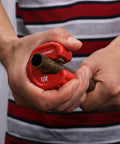 Pro Half Inch Automatic Copper Tube Cutter From HAUTMEC For Copper Aluminum Brass Tubing And Thin Wall Conduit With Half Inch Nominal Pipe Capacity Delivers Smooth Burr Free Cuts And Easy In Tight Spaces HT0215PL being used in hand for precise cutting of copper tube.