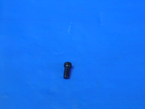 Real Deal MS1182 Indexable Insert Retaining Screw viewed from above against a blue background, designed for CNC milling applications.