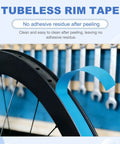Close-up of Tubeless Rim Tape 25mm By 10m PET Tire Liner for MTB Road Gravel City Touring Bicycles Blue fitting on wheel.