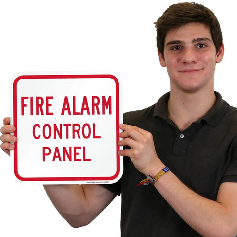 Person holding K-5834-AL-12x12 Fire Alarm Control Panel Sign Red On White Aluminum Outdoor Ready Laminated Weatherproof Graffiti Resistant