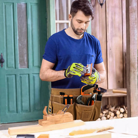 Man wearing Heavy Duty Waxed Canvas Tool Apron With 13 Pockets And Nail Apron, Woodworking Belt For Pros And DIYers
