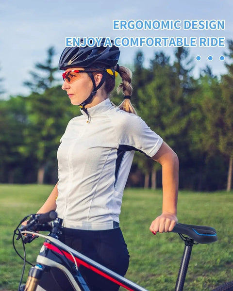 Cyclist with helmet standing beside a bike, featuring Comfy Gel Memory Foam Bike Seat For Men And Women in a park setting.