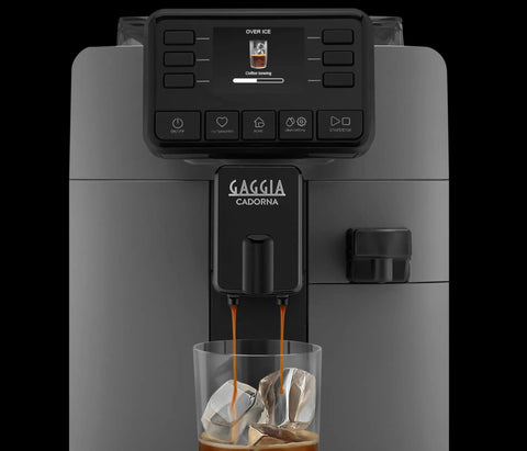 Automatic Espresso And Over Ice Coffee Maker With Professional Auto Milk Frother For Bold Iced Refreshers And Daily Grind Dominance In Sleek Moonlight Grey brewing coffee over ice with a touchscreen.