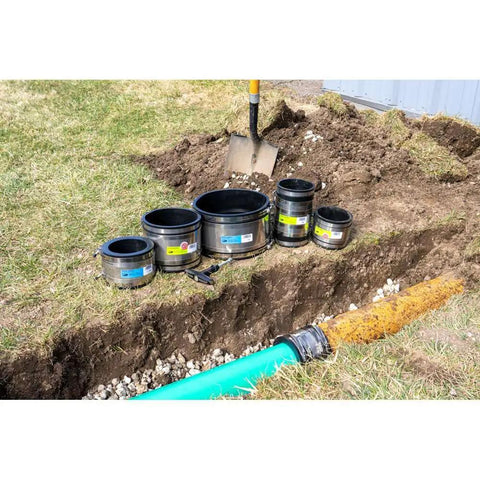 4 Inch Shielded Below Ground Sewer Pipe Coupling For Cast Iron Plastic Or Steel To Cast Iron Plastic Or Steel Plumbing Waste Connections With Elastomeric PVC Wrapped In 300 Series Stainless Steel For Heavy Duty Loads And No Fuss Pipe Alignment. Installed on underground sewer pipe trench
