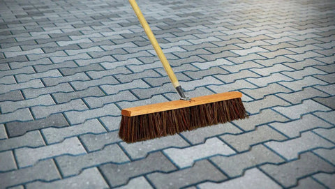 Heavy Duty 18 Inch Palmyra Bristle Push Broom For Garage Indoor Floor Sweep on patio pavers for easy debris cleanup.