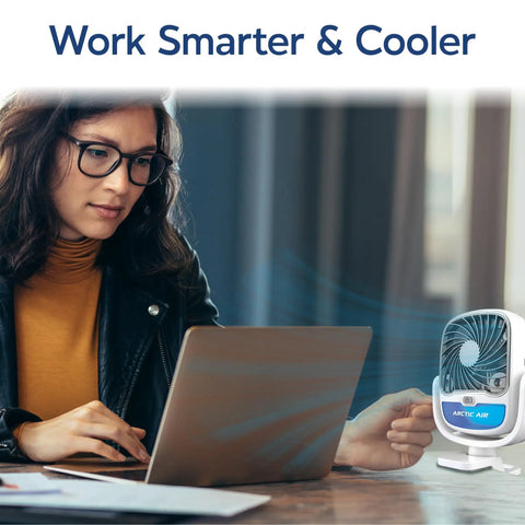 Woman using laptop with Cordless Personal Air Cooler With USB Charging 3 Speed Options Universal Clamp 360 Degree Swivel 5 Hour Battery