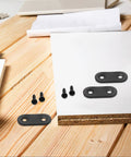Beefy Heavy Duty Iron Corner Brackets Set on wooden table with screws