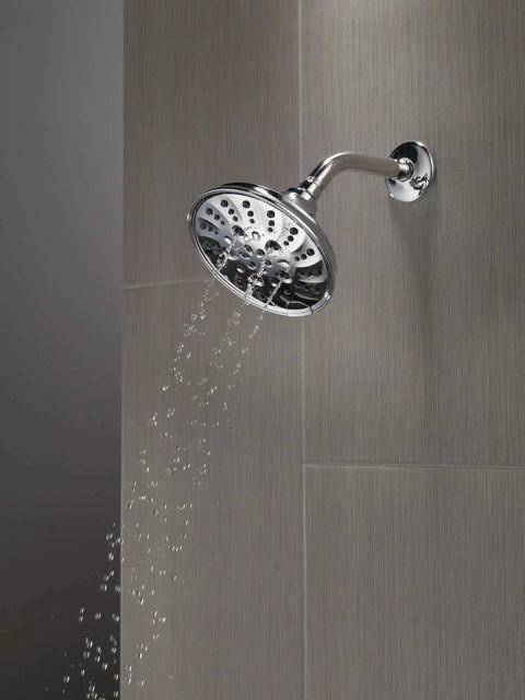 5-Setting H2OKinetic Trad Raincan Shower Head in matte black with easy touch clean spray holes installed on bathroom wall