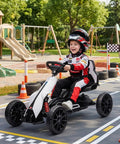 Child riding 12V Electric Go Kart For Kids With Forward And Backward Drive, Adjustable Speed, Smooth All Terrain EVA Wheels, White
