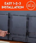 Installation of Ultra Slim TV Wall Mount For 32 To 80 Inch Flat Screens with smooth pull strings on a flat screen TV.