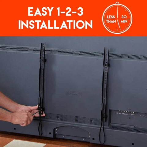 Installation of Ultra Slim TV Wall Mount For 32 To 80 Inch Flat Screens with smooth pull strings on a flat screen TV.