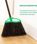 Heckin Tough Heavy Duty Brooms Two Pack angled broom head designed for sweeping dust and pet hair under cabinets and corners.