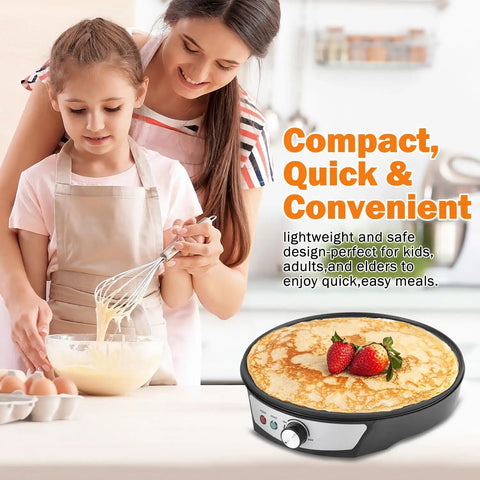 Mother and daughter cooking with 12 Inch Electric Crepe Maker with Nonstick Surface on countertop, crepe with strawberries on top.