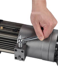 Close-up of hand tightening a bolt on the heavy duty portable electric rebar cutter for precise steel bar bending.