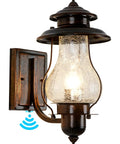 No Fuss Dusk To Dawn Sensor Outdoor Wall Sconce With Photocell, waterproof oil rubbed brown finish and crackle glass shade