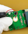 Close-up of prewired 20 Piece Piezo Pickup Kit With 27mm Piezo Discs on electronic board with contact microphone, plug and play.