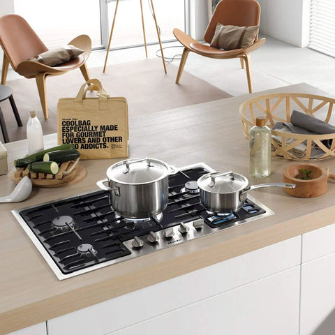 Modern kitchen with gas range stove using 10 Pack Stove Burner Covers Double Thickness Reusable Non-Stick Heat-Resistant Protectors