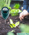 No Battery Plant Moisture Meter For Indoor And Outdoor Use Easy Soil Water Gauge shown in garden soil near plants.