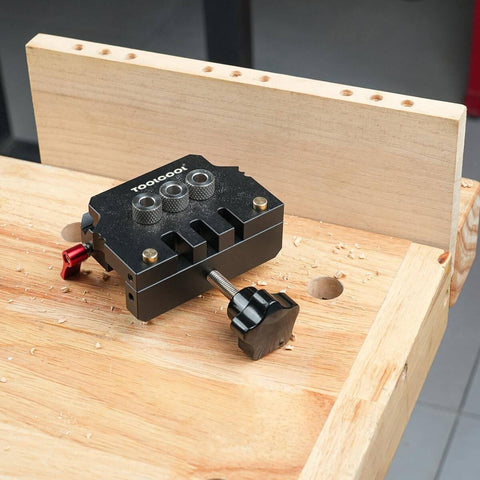 Self Centering Dowel Jig Kit For Woodworking Edge Corner And Surface Joints 6mm 8mm 10mm with aluminum body on wooden surface