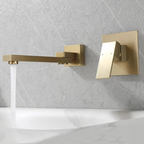 Gold wall mount tub filler with single handle and waterfall spout, modern bathroom fixture.