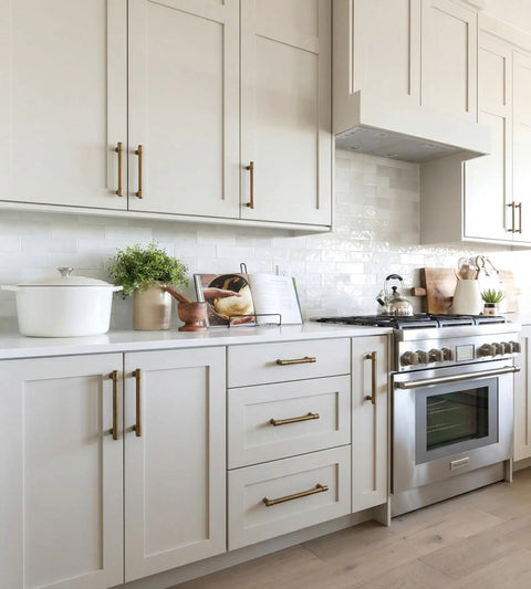 Antique Brass Cabinet Pulls 5 Inch 128mm, 10 Pack Kitchen Cabinet Handles in modern white kitchen setting